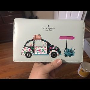 Kate Spade Clutch with Crossbody strap.